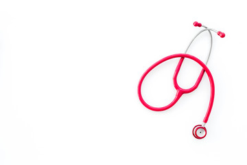 Stethoscope for family doctor set on white background top view space for text