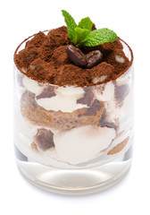 Classic tiramisu dessert in a glass isolated on a white background with clipping path
