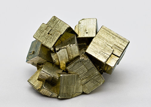 Pyrite isolated  single shiny mineral stone, fool's gold, cubic gems, on white limbo background