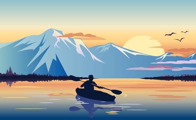 Naklejka na ściany i meble Kayaking in the mountain lake at sunset