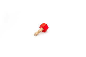wooden screw and bolts toy isolated on white background