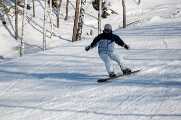 Woman doing exercise on snowboard