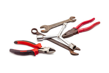 Old rusty wrench, isolated on white background