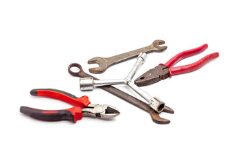 Old rusty wrench, isolated on white background