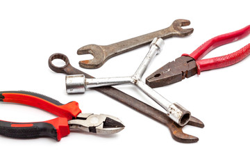 Old rusty wrench, isolated on white background