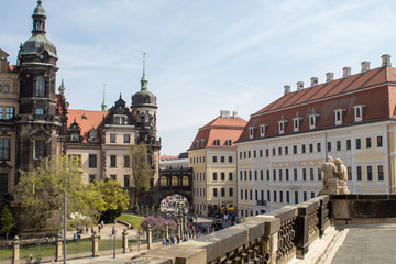 Fototapeta premium Dresden, Germany, restored Baroque architecture. Pompous and majestic city streets, tourists and transport on the holiday of Easter.