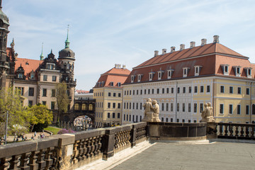 Obraz premium Dresden, Germany, restored Baroque architecture. Pompous and majestic city streets, tourists and transport on the holiday of Easter.