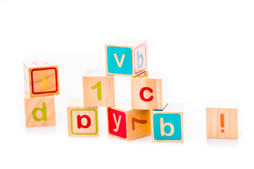 Toy cubes. Baby collection. ABC letters made from baby toys