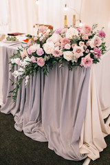 Beautiful decoration of a table at the wedding reception.