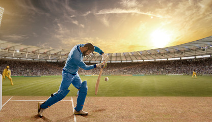 Batsman defending a ball During a match in the stadium	