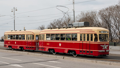 Fototapeta na wymiar MOSCOW - APRIL 20 2019: KTM1+KTP1 old tram on the Boulevard Ring