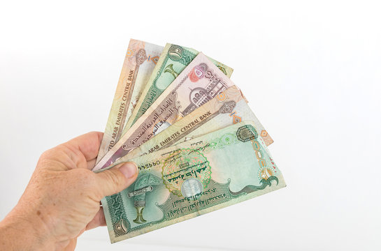 Close up different Dirhams currency note and coins, United Arab Emirates Close up different Dirhams currency note
