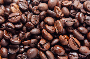 Brown coffee beans, close-up of coffee beans for background and texture