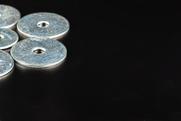 Bolts on black background