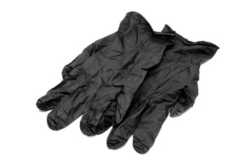 Two black rubber gloves isolated on white surface