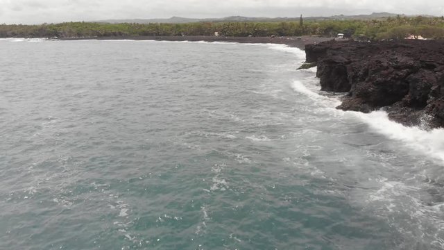 aerial of pohoiki aka Isaac Hale park. featuring new beach and lava field