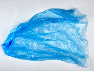 crumpled blue plastic bag for trash can