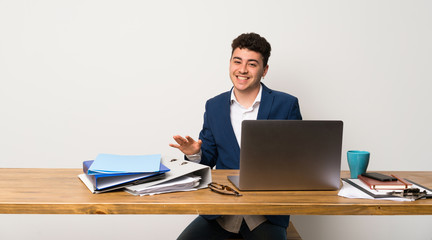 Business man in a office smiling