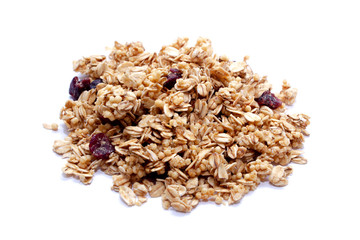 Crunchy granola or muesli scattered, isolated on white, top view.