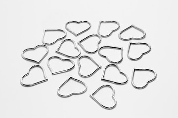 Metal hearts on a gray background