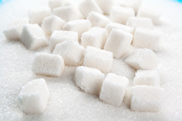  scoop with white sand and lump sugar close up background