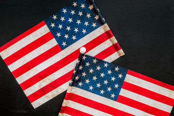 Fototapeta premium Memoral day of United States of America with flag on black background top view