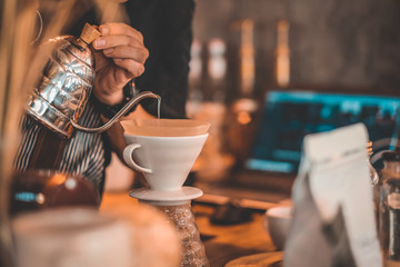 Hand drip coffee , Barista is making coffee