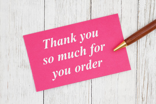 Thank you so much for your order text on pink card with pen
