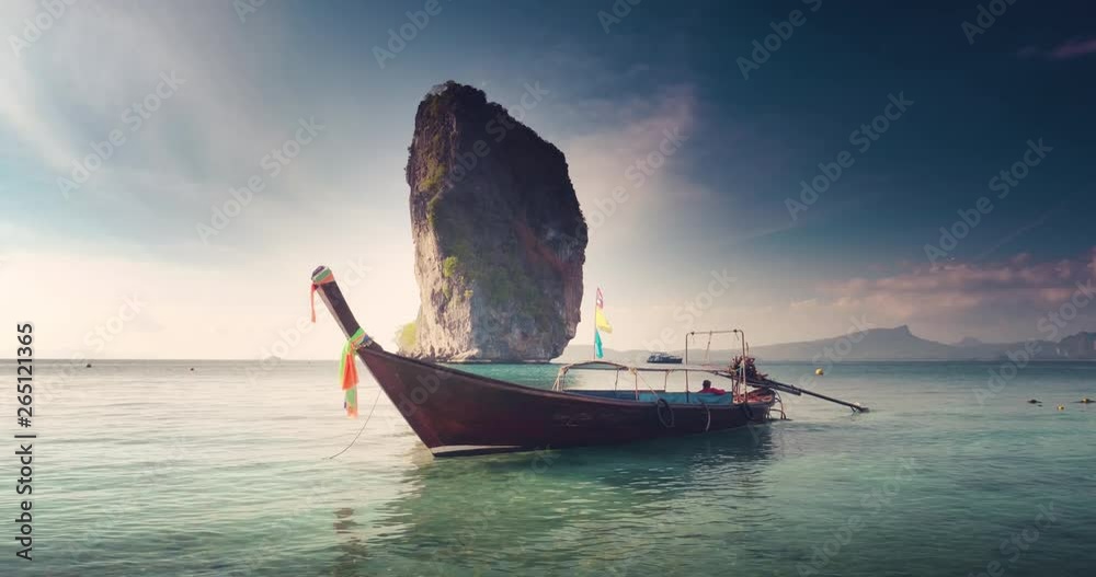Wall mural wooden longtail boat at koh poda island in krabi province. ao nang, thailand