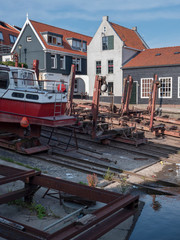 Fototapeta na wymiar Urk Noordoostpolder Netherlands fishingboats harbor