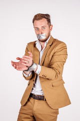 young businessman on white background. human emotion facial expression reaction attitude.