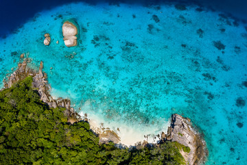 Aerial drone view of paradise tropical islands and coral reef
