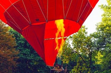 Filling the balloon dome with hot air from a gas burner
