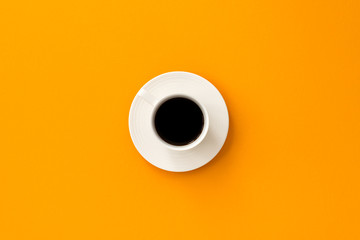 black coffee on yellow background 