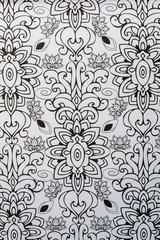 Fototapeta premium Arrière plan noir et blanc au motif graphique fleuri