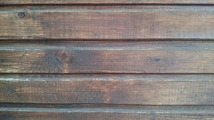 Fototapeta premium brown background old wooden panels with knots