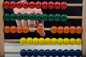 teach children numbers with colorful abacus. Kids activity time in school.