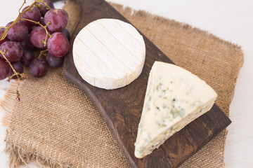 Blue cheese or brie with grapes and nuts