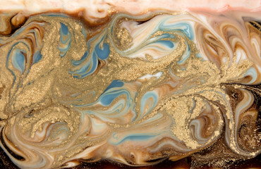 Beige and blue marbling pattern. Golden marble liquid texture.