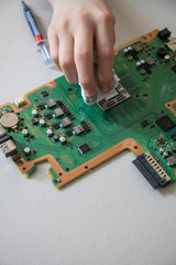 Cleaning and replacing thermal paste on a CPU from a limited addition computer console motherboard