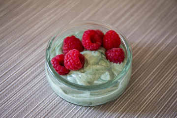 Matcha green tea yogurt and raspberries