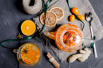 Sea buckthorn tea with ginger, berries and cinnamon