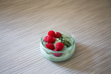 Matcha green tea yogurt and raspberries