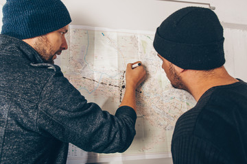 Mafia guys planning robbery on city map