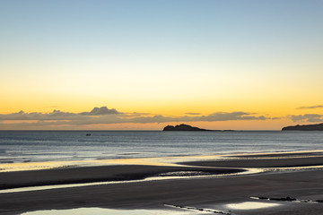 Sunrise on Portmarnock Beach with Ireland's Eye in the background