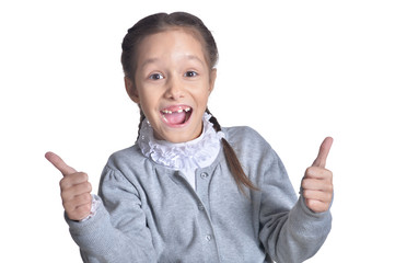 portrait of cute little girl with thumbs up 