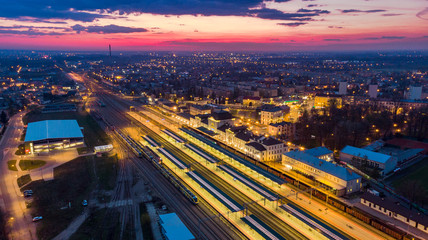 Fototapeta na wymiar Illuminated train station in Tarnow,Poland.Aerial view