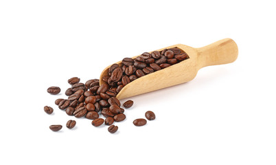 Wooden scoop of roasted coffee beans on white