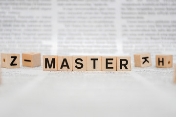 Master Word Written In Wooden Cube