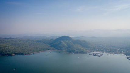 Island scenery and beautiful water with blue sky and morning fog at Srinakarin Dam, Kanchanaburi, Thailand Wonderful scenes of nature in the morning